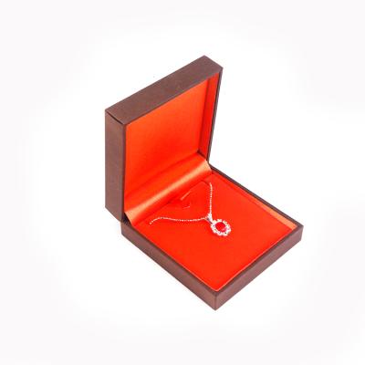 China Retro Brown Plastic Special Paper Orange Retro Velvet Lined Pendant Jewelry Box Customized for sale