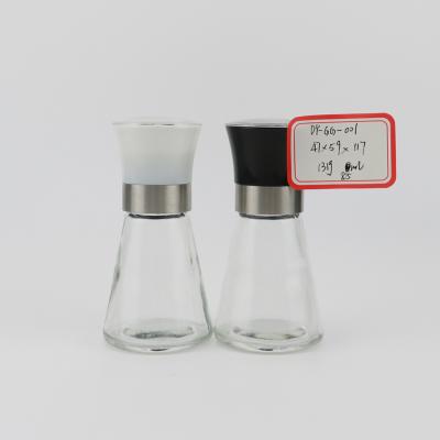 China Sustainable Competitive Manual Kitchen Salt And Pepper Mill Transparent Grinders With Glass Bottle for sale