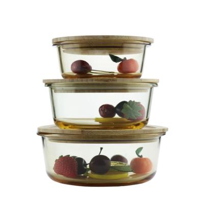 China Sustainable Round Heat Resistant Glass Food Storage Box With Cover Bamboo for sale