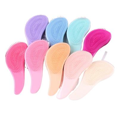 China 2021 Waterproof Newest Egg Shaped Comb Hair Brush Anti-static Glitter Massage Tangle Detangle Shower Massage Hair Brush Comb for sale