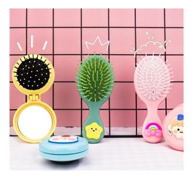 China Soft Synthetic Hair 1 Pcs Portable Lovely Girls Comb Mini Folding Comb Airbag Massage Travel Oval Hair Brush With Round Anti-Static Makeup Mirror for sale