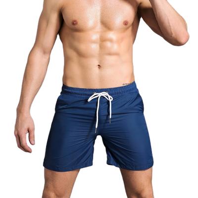 China Solid Color QUICK DRY Sports Shorts Men's Summer Fitness Basketball Training Breathable Running Shorts Leisure Quick Dry Thin Shorts for sale