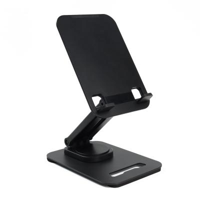 China Adjustable Universal Plastic Foldable Tablet Stand Cell Phone Stand Lazy Desk Mobile Phone Stand Cell Phone Angle Holder for sale