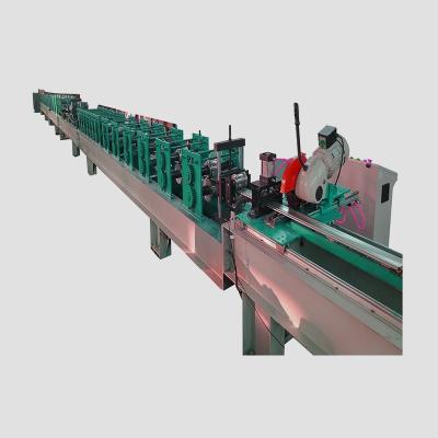 China Hotels Full Automatic 82 PU Foam Shutter Door Making Machine Shutter Door Frame Roll Forming Machine for sale