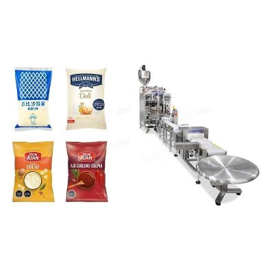 China Landpack LD-420L Food For Oil Self-Suction Liquid Stick Honey Tomato Paste Packing Machine for sale