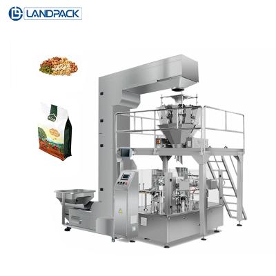 China Landpack automatic food packing machine prices pneumatic cashew nuts doypack packaging machine for nuts for sale