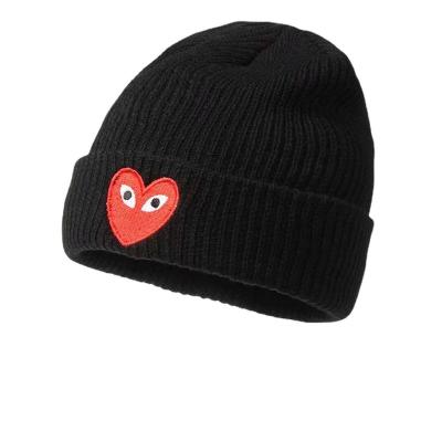 China Unisex Skull Ski Beanie With Red Heart Embroidered Soft Thick Warm Hat Women COMMON Chunky Stretch Cable Knitted Beanie for sale