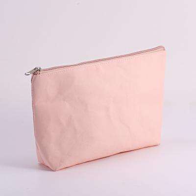 China Eco - Friendly Custom Washable Cosmetic Kraft Paper Zipper Bag For Storing Wash Paper Bag for sale