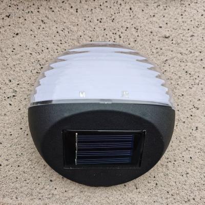 China Warm Outdoor Black Plastic Solar Warehouse Fence Light LED Wall Light for sale