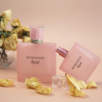 China Luxury Personal Care Beautiful Pink Screen Printing Picture Bottle 50ml 100ml Royal Spray Glass Rose Perfume Bottle Wholesale for sale