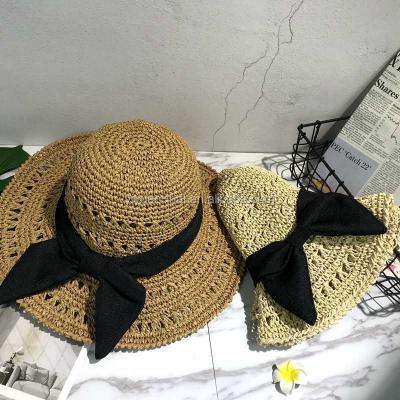 China Wholesale Character Packable Foldable Umbrella Straw Crocheted Beach Ladies Paper Hats/Black Bow for sale