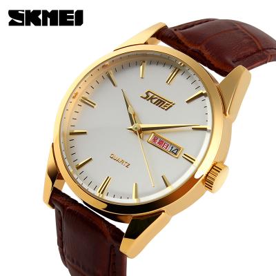 China Luxury Water Resistant Mens Watch Made In China High Quality Genuine Leather Strap Watch SKMEI 9073 Quartz Watch for sale