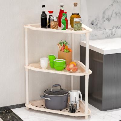 China Hot Selling Pink Kitchen Bathroom Storage Rack Viable Plastic Accessories Portable Corner Shelf for sale