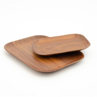 China Good Quality Sustainable Soft Edge Turn Walnut Wood Plates Wooden Solid Wood Food Dish For Kitchen for sale