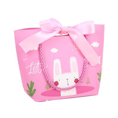 China Recyclable Wholesale Custom Colored Rose Shape Gift Paper Shopping Bag With Ribbon Handles for sale