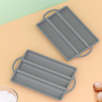 China Sustainable Manufactory Wholesale 3 Caves Rectangle silicone Baguette mold Baking Tray Cake Molds for sale