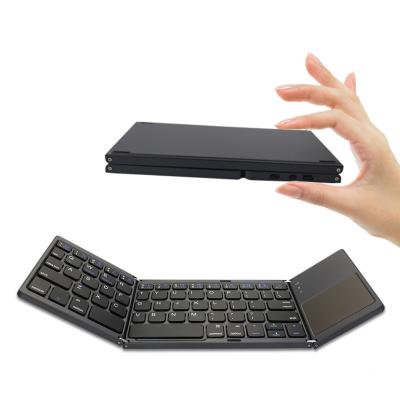 China Mini Keyboard Foldable Wireless Bluetooth Full Size Foldable Slim Keyboard with Touchpad for Tablets, Notebooks, Mobile Phones for sale