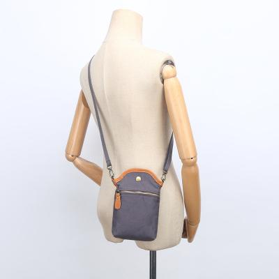 China Wholesale Soft Canvas Unique Vintage Mini Mobile Crossbody Bag Sling Leather Bag For Women Girl Lady for sale