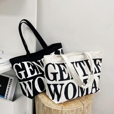 China Gift Bag Fashion New Printed Letter Canvas One Shoulder Canvas Large Capacity Tote Bag Shopping Bag for sale