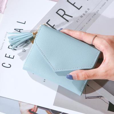 China 2020 Female Pure Leather Purse Pocket Ladies Waterproof Hot Selling Short Wallets for sale