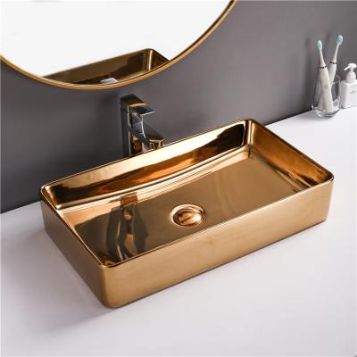 China Ceramic Luxury Bathroom Gold Bathroom Sink Hotel Face Hand Wash Basin Set Vessel Toilet Tabletop Modern Porcelain Basin Top for sale