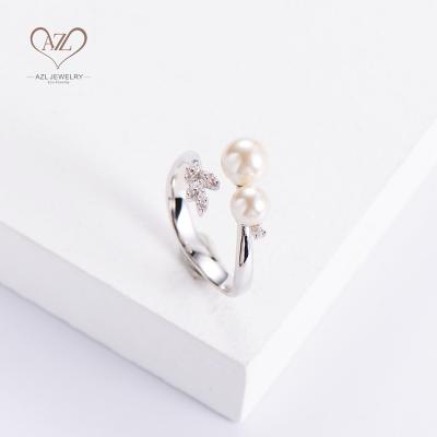 China FASHIONABLE Korean Zircon Stone Flower Shape Leaf Jewelry Brass Silver Pearl Rings For Girls for sale