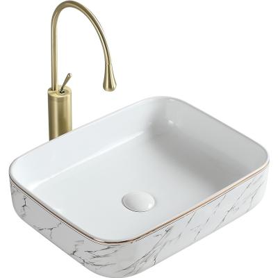 China Modern Luxury Square Marble Countertop Bathroom Sink wihte Europe Ceramic Basin With Rose Gold Line. OEM is serviced. for sale