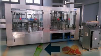 China Automatic Rinsing Filling Capping Machine , Plastic Bottle Tea / Beverage Filling Equipment for sale