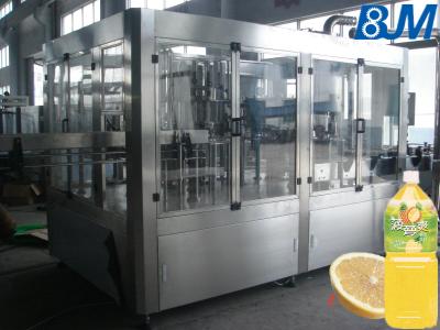 China Electric Rotary 4 In 1 Pet Bottle Filling Machine For Apple / Orange Fruit Juice Plant for sale