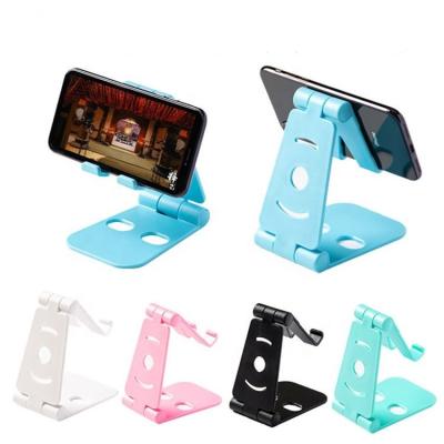 China Factory Adjustable Multi-Function Desktop Multi-Functional Desktop Stand Mobile Phone Cheap Simple Folding Plastic Holder for sale