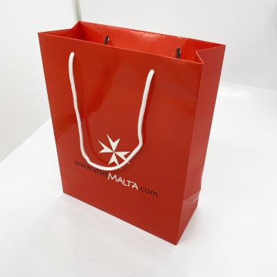 China Recyclable Custom Logo Printing Paper Bag Glass Glossy White Red Paper Bag With Handle for sale