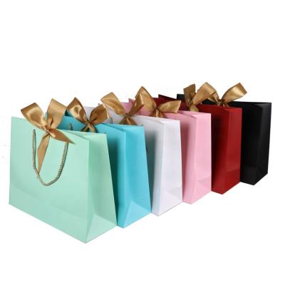 China Recyclable Custom Logo Printed Wedding Recycled To Take Out Paper Gift Packaging Bags for sale