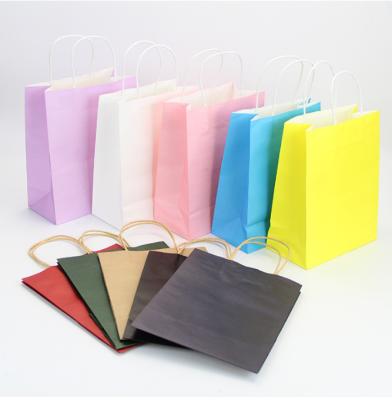 China BIODEGRADABLE Promotional Cheap White Kraft Paper Candy Paper Gift Bag With Handle For Birthday, Halloween Gifts for sale