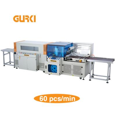 China Automatic Mobile Fully Automatic Shrink Wrap Machine Shrink Wrap Book Food Cup Wrapping Machine for sale