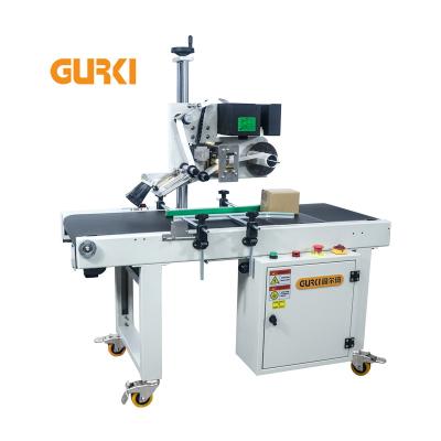 China Small Automatic Food Express Cardboard Box Flat Label Cardboard Sticker Labeling Machine for sale