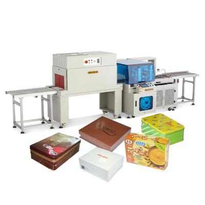 China Automatic Cartoon Food Shrink Box Cell Phone Box Shrink Box Rigid Plastic Packing Sealer Automatic Shrink Paper Wrapping Machine for sale