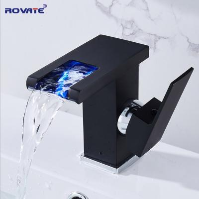 China LED Light ROVATE Modern Design Black Bathroom Basin Faucet with LED Waterfall System Hotel Wash Basin Hot and Cold Water Mixer Brass for sale