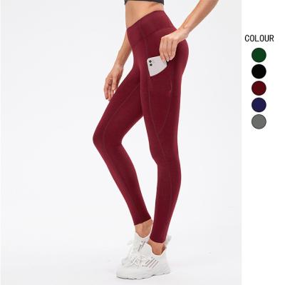 China Breathable Add Velvet Keep Warm Pocket Fitness Yoga Wear Gym Leggings For Women Tights Scrunch Butt Yoga Pants Gym Leggings for sale