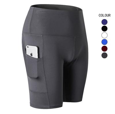 China New QUICK DRY Women Yoga Stretch Tight Shorts With Pockets Fitness Yoga Wear Plus Size Yoga Shorts for sale