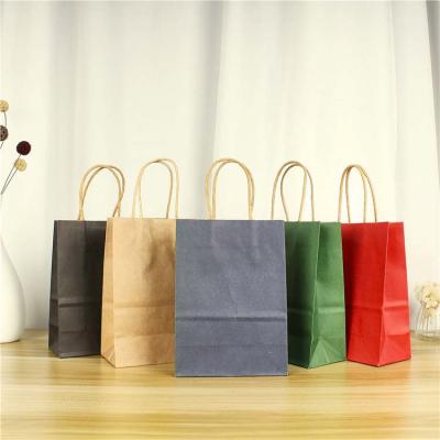 China Recycled Materials Kraft Paper Gift Paper Bag Paper Bags With Your Own Logo Brown Kraft Paper Suitcase With Rope Handle for sale