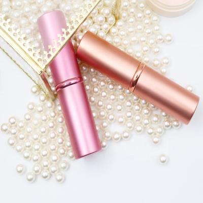 China Mini Metal Synthetic Hair Kabuki Handle Short Stain Brush New Can Telescopic Pink Rose Gold Custom Makeup Brushes for sale