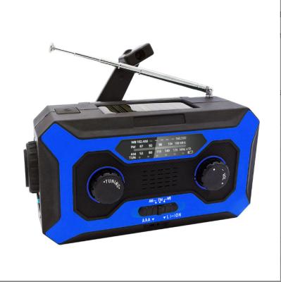 China LCD Display 4000mAh Solar Time AM FM Crank Radio Portable Backup Generator With Flashlight for sale