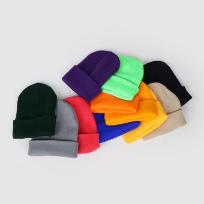 China COMMON Wholesale Custom Embroidery Woven Label Unisex Pure Color Winter Knitted Hats Winter Beanies for sale