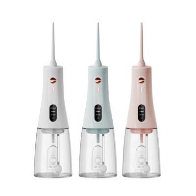 Cina Irrigatore orale con schermo LCD ricaricabile USB Irrigatore orale impermeabile per uso domestico e portatile Cure odontoiatriche Sbiancamento dei denti Flosser in vendita