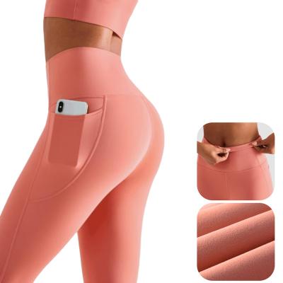 China Breathable Wholesale Fitness Wear Custom Logo Workout Leggings with Pocket Butt Lifting High Waist Gym Sport Yoga Leggings for sale