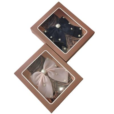 China Handmade Custom Logo Folding Paper Cardboard Gift Box Packaging Display Headdress Ornaments Boxes With Clear Window for sale