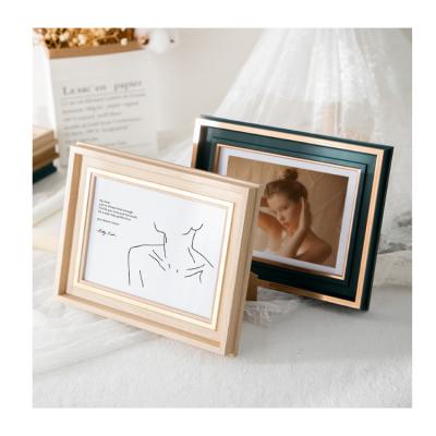 China Custom Printing Simple Solid Wood Logo Photo Frame Wood Creative Photo Frame for sale