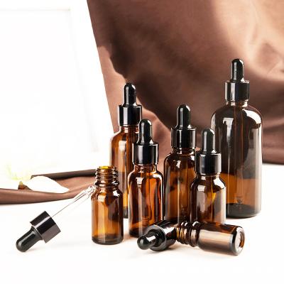 China Personal Care Glass Bottle For Essential Oil With Dropper Variety Cap for sale