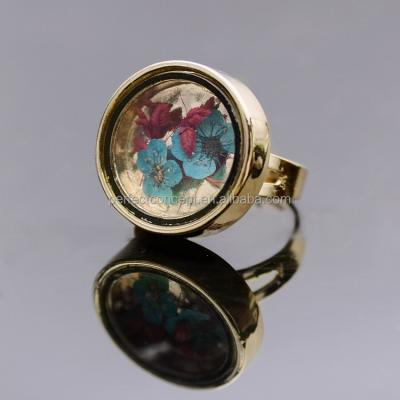 China ALLOY Dry ​​Flower Glass Pendants Ring Blue Red Ring for sale