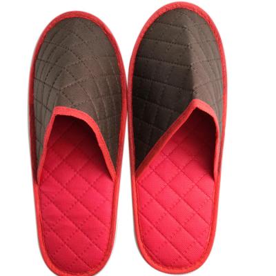 China Disposable high quality custom hotel ultrasonic embossed nonwoven slippers for sale